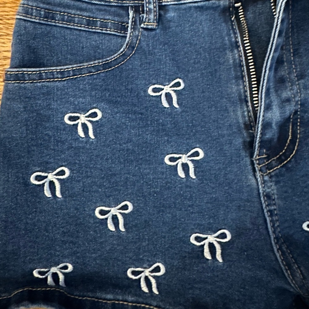 denim jean shorts with embroidered bows - Picture 2 of 5